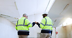 Men, architect and happy with fist bump, team and excited for results with building inspection. People, technician and engineer with goals, motivation and support with feedback at construction site
