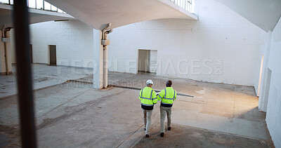 Buy stock photo Men, architect and back with blueprint, discussion and review for design with building inspection. People, technician and engineer with floor plan, paper and above with feedback at construction site