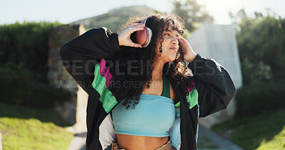 Buy stock photo Fashion, park and woman dance to music with energy, freedom and radio song. Listening to headphones, smile and dancer outdoor for hip hop, streaming audio and sound with stylish retro streetwear