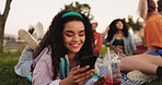 Communication, woman and smartphone on picnic, smile or texting with contact on social media or app. Friends, reunion and happy with chat on website, people and message with mobile, outdoor or typing
