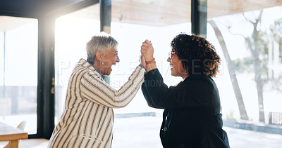 Buy stock photo Business women, high five and happy at office with success, goals or congratulations for achievement. People, team and mentor with celebration, thanks and promotion by window at insurance agency