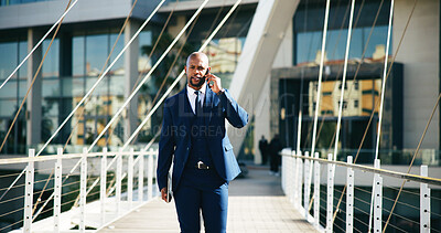 Buy stock photo Phone call, real estate and walking with business black man outdoor in city for networking or travel. Communication, commute and development with corporate employee on bridge downtown for update