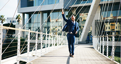 Buy stock photo Celebration, hand up and walking with business black man in city for dance or success. Corporate, tablet and victory with winner employee on downtown bridge for achievement, commute or opportunity