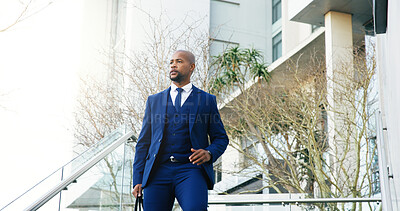 Buy stock photo Commuting, employee and man in city, stairs or rush to work in morning, trip and attorney with case. Thinking, lawyer and black person in hurry for trial, serious and journey to court and reflection