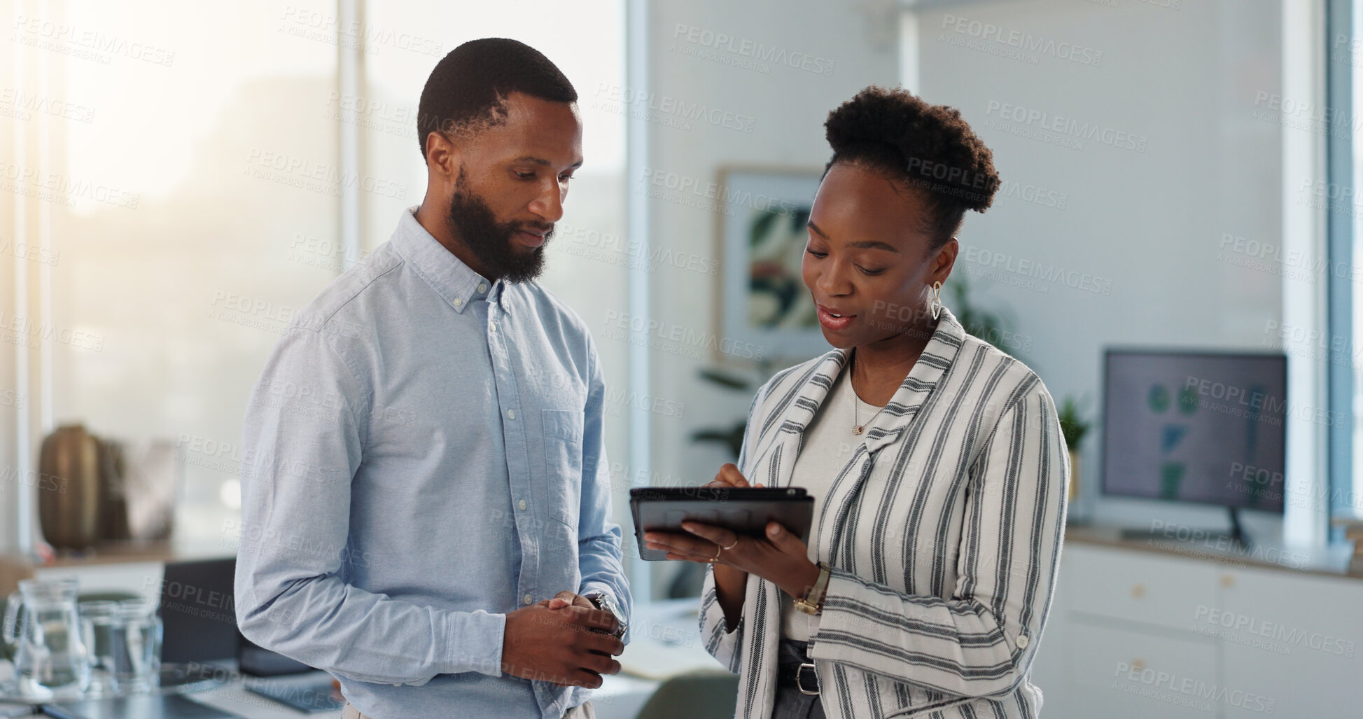 Buy stock photo Planning, business people and team with tablet in office for investment, analysis and feedback. Technology, brainstorming and collaboration with African workers in meeting to review financial graphs