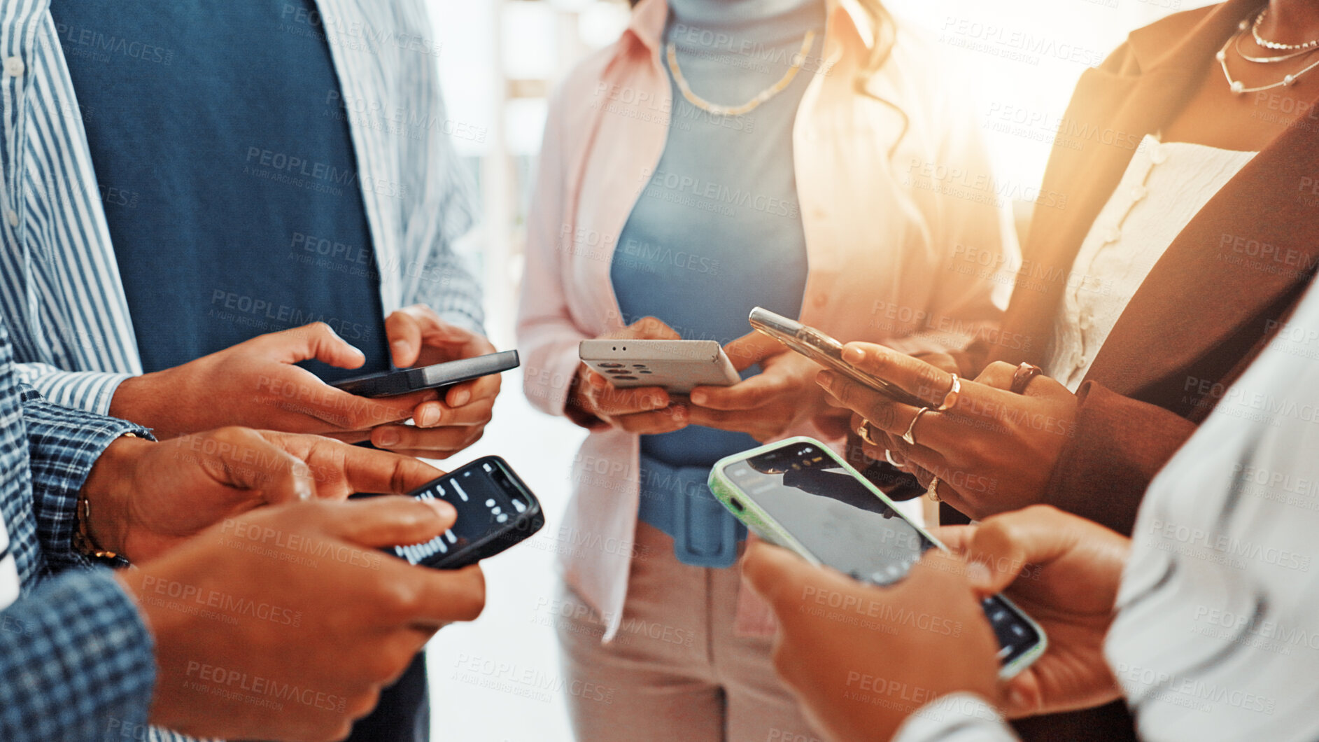 Buy stock photo Business people, phone and hands in circle for networking, social media and sharing information at office. Group of employees, teamwork and mobile smartphone for app, online website or data sync