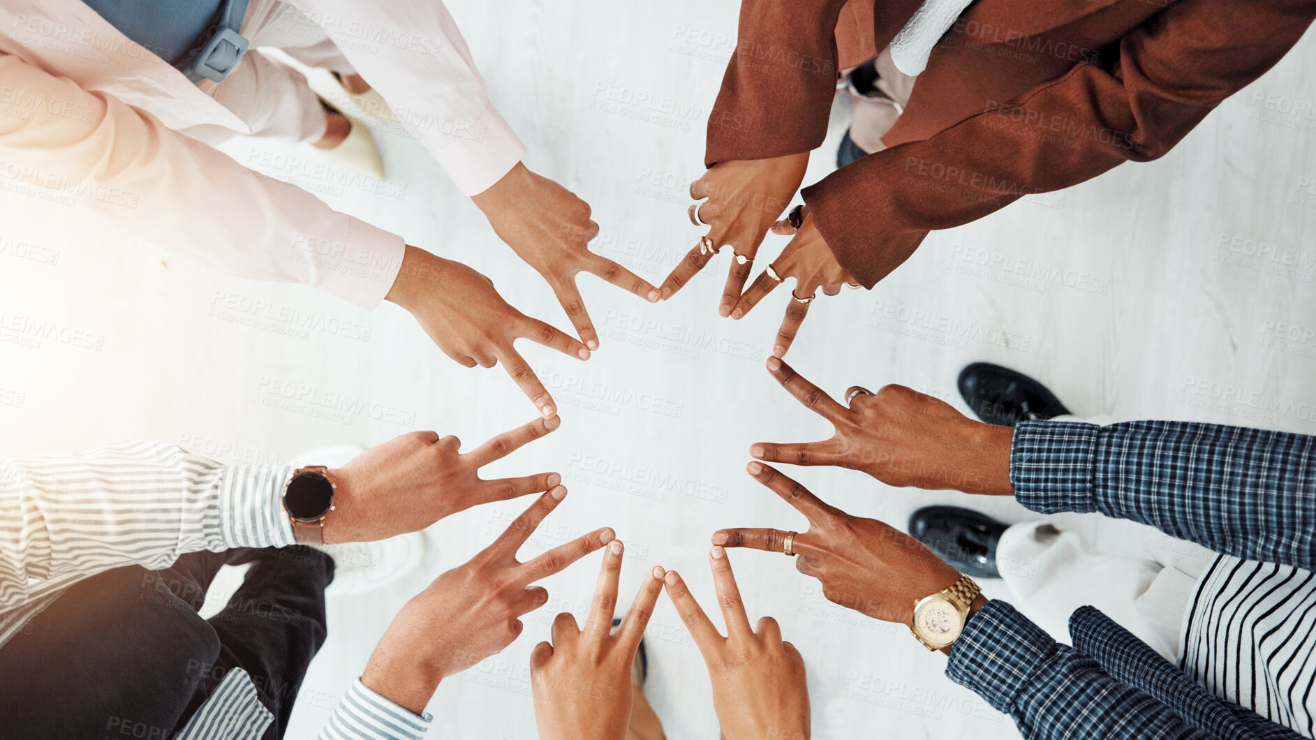 Buy stock photo Business people, meeting and top view of star with hands, collaboration or team building. Above, community or group of employees with fingers in office for synergy, strategy or solidarity together