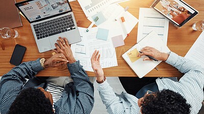 Buy stock photo Teamwork, laptop and documents with business people in office for meeting, schedule or research. Budget report, project progress and paperwork with above of employees for online review and planning