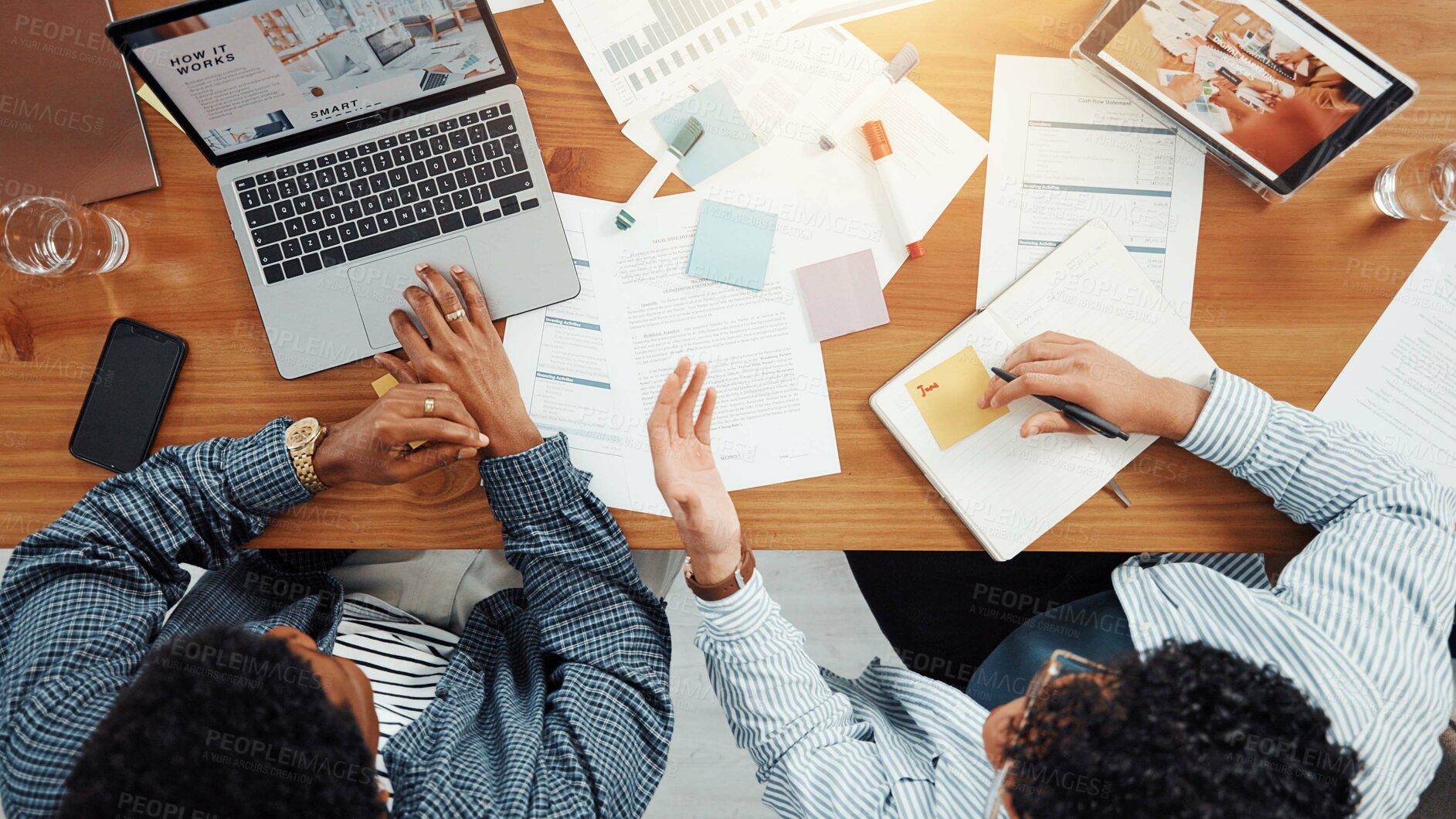Buy stock photo Teamwork, laptop and documents with business people in office for meeting, schedule or research. Budget report, project progress and paperwork with above of employees for online review and planning