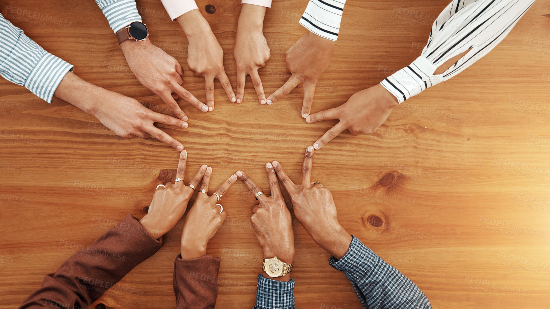 Buy stock photo Business people, hands and top view of star with support, collaboration or team building. Above, group or employees with fingers on wooden table in office for synergy, meeting or solidarity together