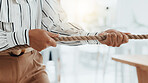 Tug of war, rope and businesswoman in office for game, opposition or challenge in legal case. Power, hands and female lawyer with activity for battle, fight or competition for job promotion.