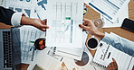 Hands, meeting and above with documents, finance and review with graphs for stats at office. Men, women and paperwork with laptop, charts and feedback for performance, revenue and pc at company