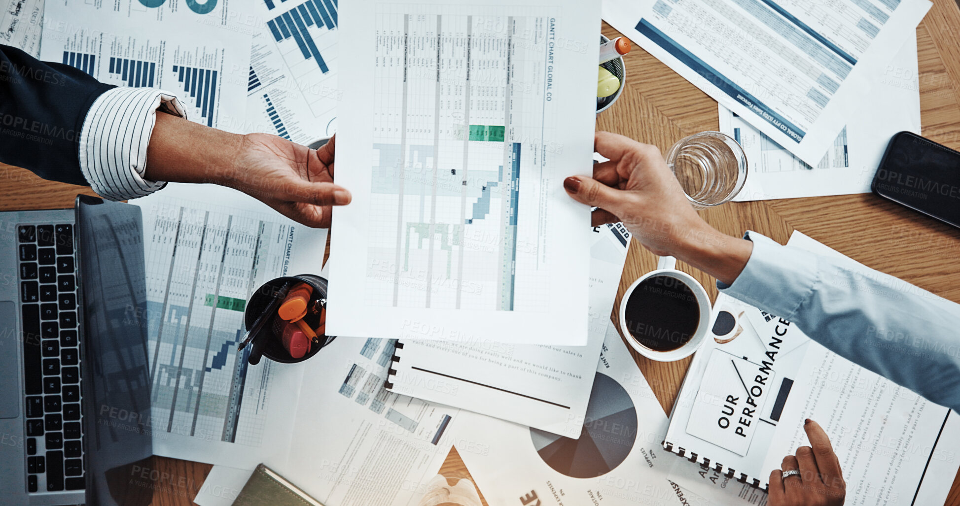 Buy stock photo Hands, meeting and above with documents, finance and review with graphs for stats at office. Men, women and paperwork with laptop, charts and feedback for performance, revenue and pc at company