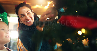 Buy stock photo Christmas tree, decoration and smile of mother with daughter in living room of home for celebration. Creative, event or festive with happy single parent and girl child getting ready in apartment