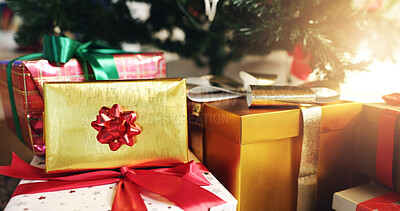 Buy stock photo Christmas, gifts and boxes with ribbon by tree for festive holiday, celebration or giving in home. Empty, presents or packages with decor for december, secret santa or surprise on floor in house