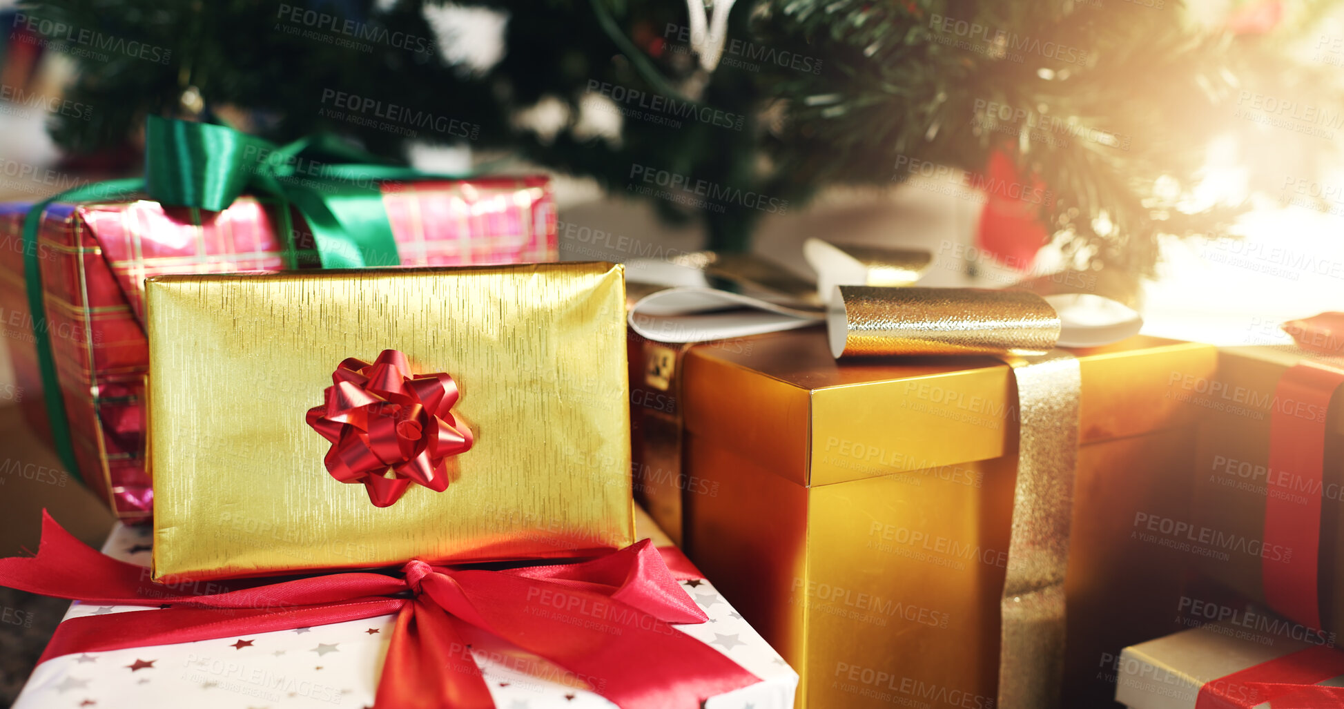 Buy stock photo Christmas, gifts and boxes with ribbon by tree for festive holiday, celebration or giving in home. Empty, presents or packages with decor for december, secret santa or surprise on floor in house