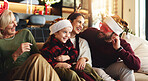 Grandparents, parents and child in home for Christmas, festive season and bonding on holiday. Happy family, laugh and girl with mom, dad and senior people relax for tradition, celebration and xmas