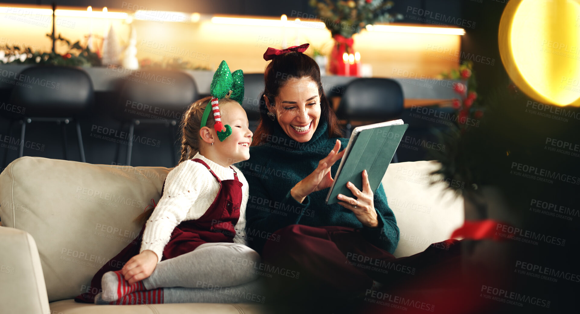 Buy stock photo Christmas, happy mother and kid with tablet in home for holiday movie, game and watch cartoon. Xmas, parent and child with tech in living room for festive show, learning and family bonding together