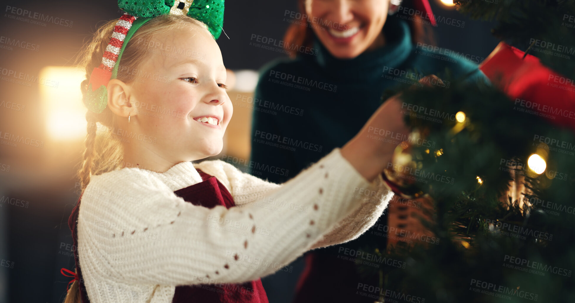 Buy stock photo Christmas, decoration or tree with mother and daughter in living room of home for celebration. Creative, event or festive with smile of girl child and happy single parent getting ready in apartment