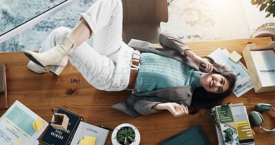 Buy stock photo Above, phone call and smile with woman on table in office for business, break or conversation. Communication, contact and relax with happy social media manager lying on desk at work for discussion