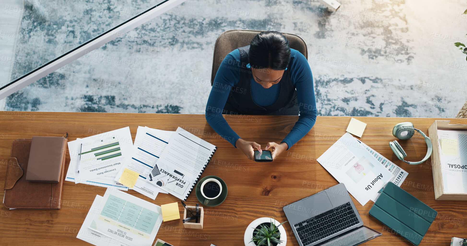 Buy stock photo Above, woman or phone in office for social media marketing, research, engagement or trends. Paperwork, planning and content strategist with mobile app for creative project or online platform at desk