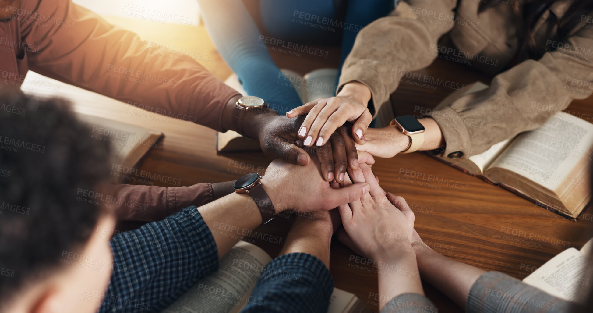 Buy stock photo Stack of hands, bible and people by table for unity, solidarity and support at religion study. Trust, top view and prayer group with partnership and collaboration with holy book for worship community