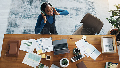 Buy stock photo Headphones, documents and black woman in office with music, radio or album online from above. Happy, paperwork and African female financial advisor listening to playlist for productivity in workplace
