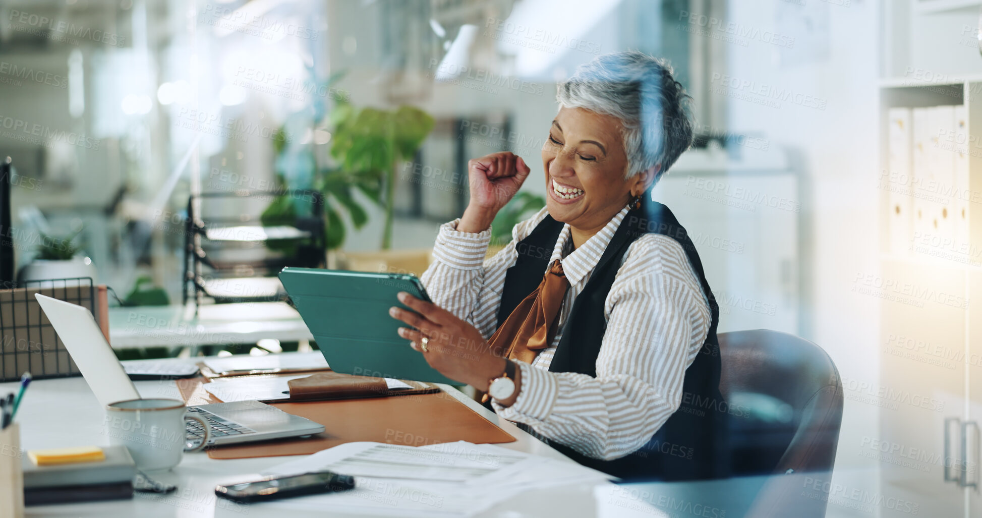 Buy stock photo Business, celebration and woman in office, tablet and cheering with achievement, investment and deal. Mature person, success or financial advisor in workplace, tech or app for profit growth or smile