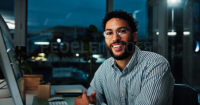Buy stock photo Portrait, working late and happy businessman in office for financial banking with computer. Smile, glasses and investment professional on overtime at night, employee and confident broker in Portugal