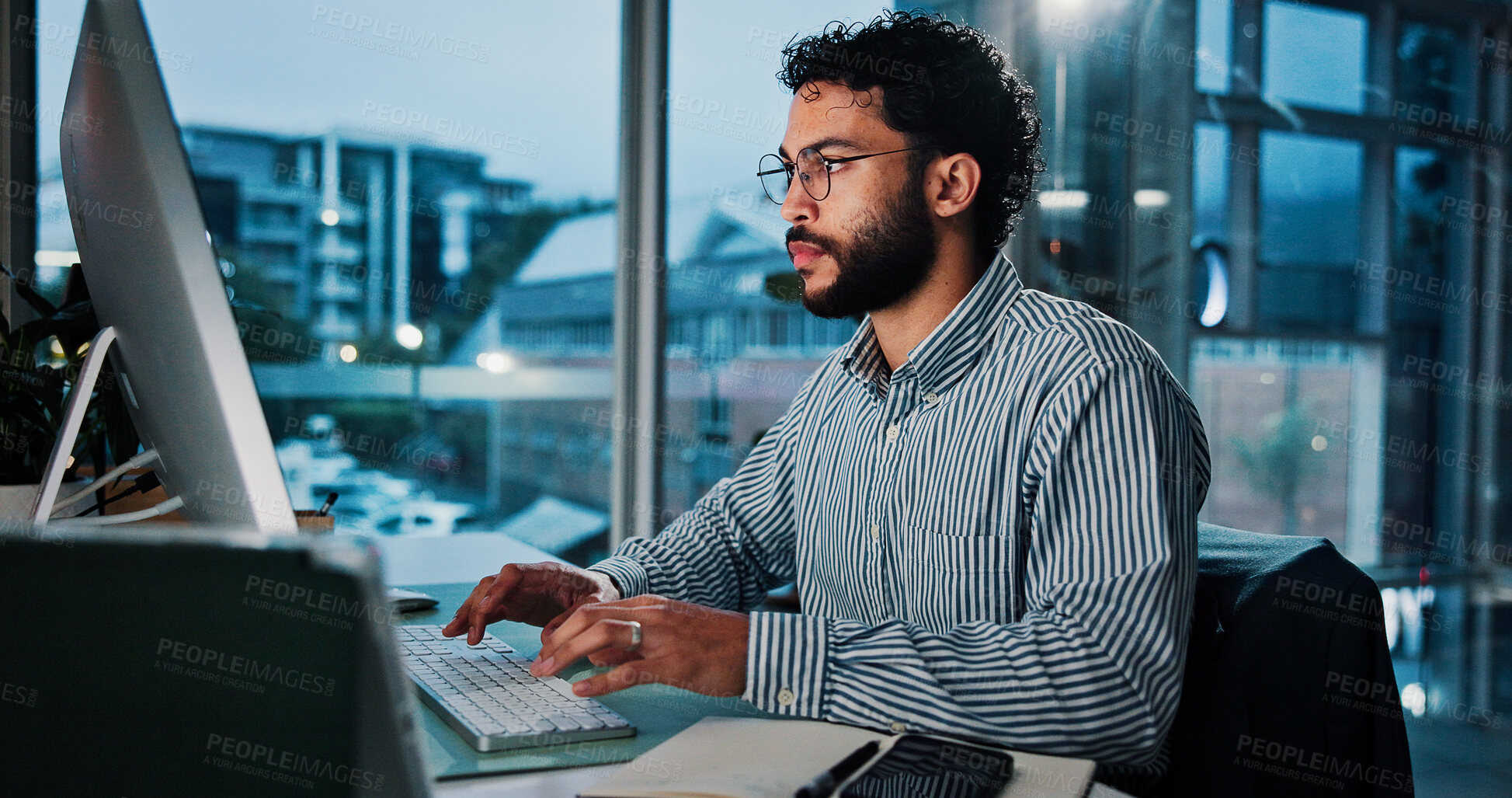 Buy stock photo Computer, night and typing with business man in office for investment or stock market trading. Economy, exchange and money with financial broker in workplace for evening portfolio management