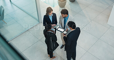 Buy stock photo Meeting, lobby and above of business people in office for planning, discussion and finance review. Professional, corporate and workers with tablet for online proposal, budget report and feedback
