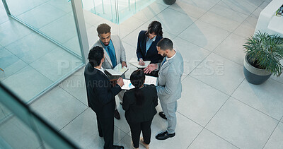 Buy stock photo Meeting, lobby and above of business people with documents for planning, discussion and feedback Professional, corporate and workers on tablet for online proposal, budget report and finance review