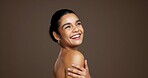 Thinking, woman and happy with skincare, cosmetics or bodycare for smooth skin or studio background. Mockup space, reflection and person with smile for wellness, dermatology and facial treatment