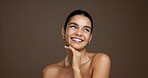 Thinking, woman and happy with skincare, shine and cosmetics for smooth skin, glow and mockup space. Studio background, reflection and person with smile for beauty, dermatology and facial treatment