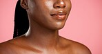 Beauty, cosmetics and mouth of black woman in studio for dermatology, skin hydration or vitamin C. Lips, skincare and wellness with model person isolated on pink background for facial aesthetic