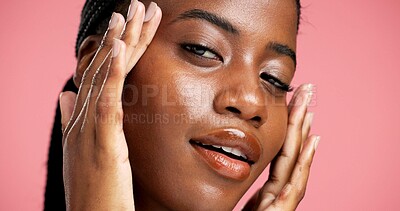 Buy stock photo Beauty, woman and portrait with skincare in studio for hydration treatment, glow and self care. Dermatology, black girl and cosmetics results with face shine and morning routine on pink background