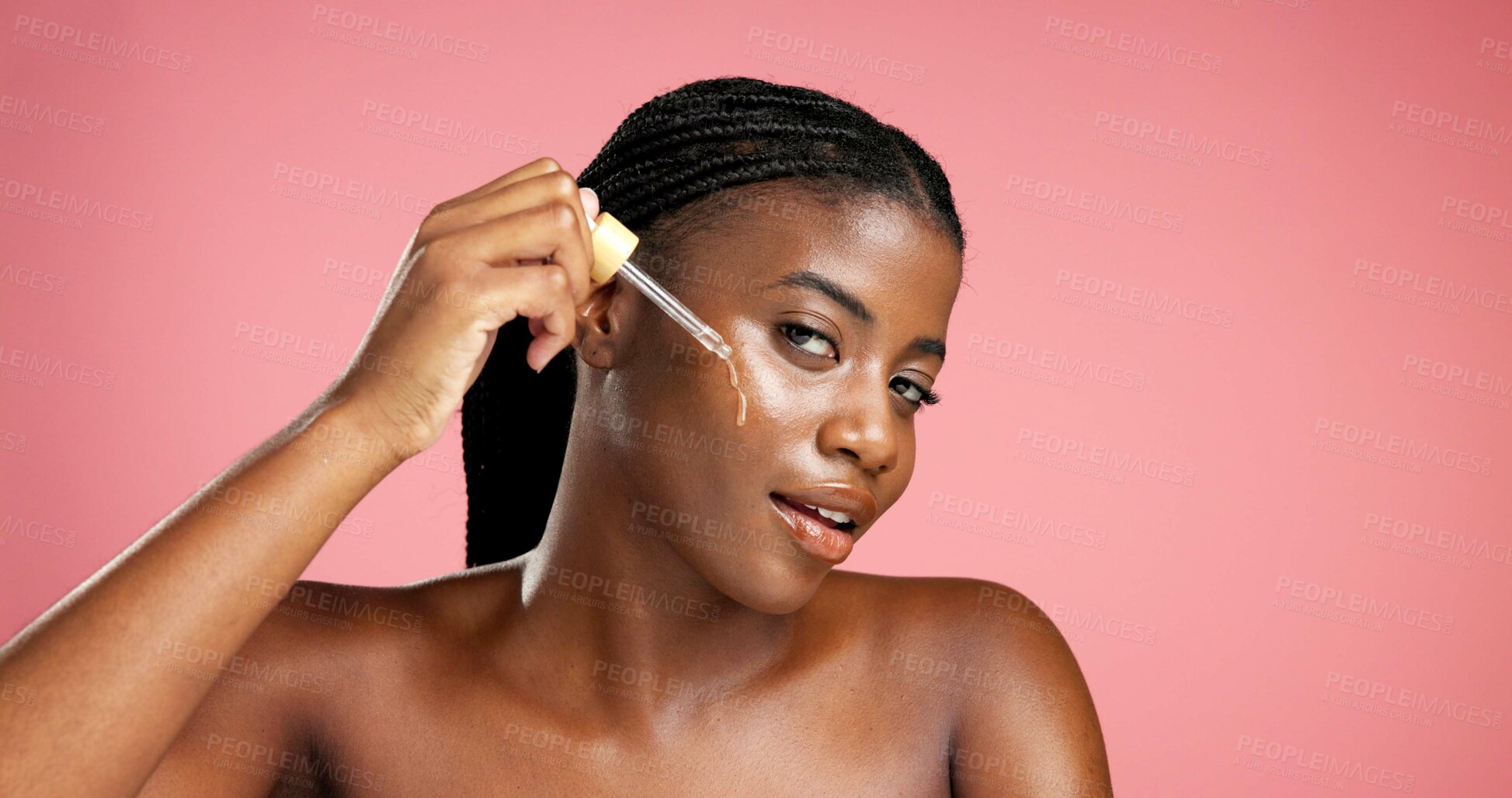 Buy stock photo Portrait, facial treatment and black woman with serum, healthy skin and cosmetics for glow or shine. Mockup space, person and oil with anti aging benefits, studio background and pride for beauty