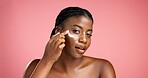 Portrait, cosmetics and black woman with cream, smooth skin and smile for skincare and mockup space. Happy, person and facial treatment for wellness, studio background and lotion for beauty or shine