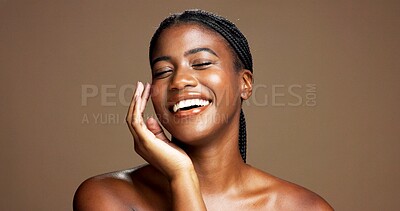 Buy stock photo Skincare, smile and black woman in studio with cosmetics, collagen treatment or moisturizer. Glow, model and facial beauty for dermatology, anti aging or hydration for soft skin on brown background