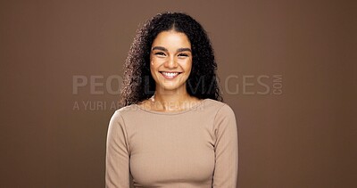 Buy stock photo Natural, happy and portrait of woman in studio for beauty, curly hairstyle and healthy texture. Hair care, mockup space and person with shine for treatment, growth and cosmetics on brown background