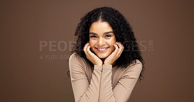 Buy stock photo Glow, smile and hands with portrait of woman in studio for natural makeup, beauty and self care. Happiness, shine and aesthetic with person on brown background space for dermatology and hydration