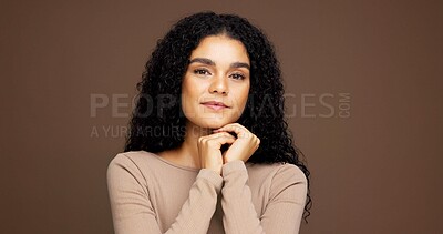 Buy stock photo Makeup, portrait and woman in studio for cosmetics, beauty or facial glow with glamour. Smile, natural and female person from Colombia with face cosmetology for confidence by brown background.