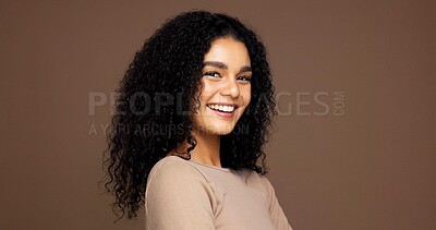 Buy stock photo Studio, hair care and portrait of happy woman with beauty, growth and volume on brown background. Curly hairstyle, smile and model with cosmetics for hairdresser or salon treatment with mockup space