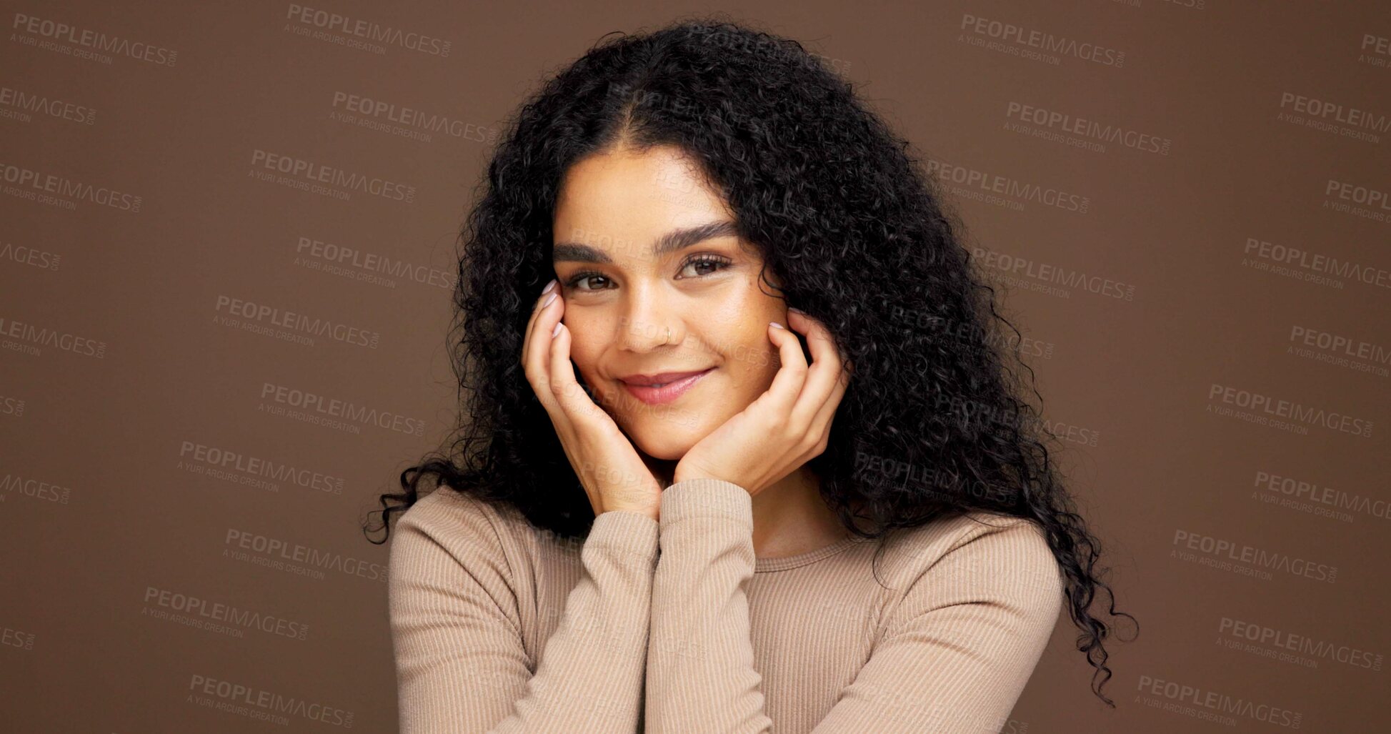 Buy stock photo Cosmetology, portrait and woman in studio for beauty, makeup or facial glow with happiness. Smile, natural and female person from Colombia with face cosmetics for confidence by brown background.