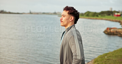 Buy stock photo Fitness, lake and thinking with man outdoor in nature for cardio, running or training routine. Ideas, view and vision with runner or sports athlete in park for development, improvement or workout