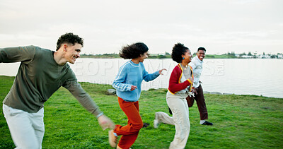 Buy stock photo Holiday, friends and running outdoor at lake for bonding, excited students and adventure together. Man, woman and group race on vacation for travel, journey and happy with energy on gap year by park