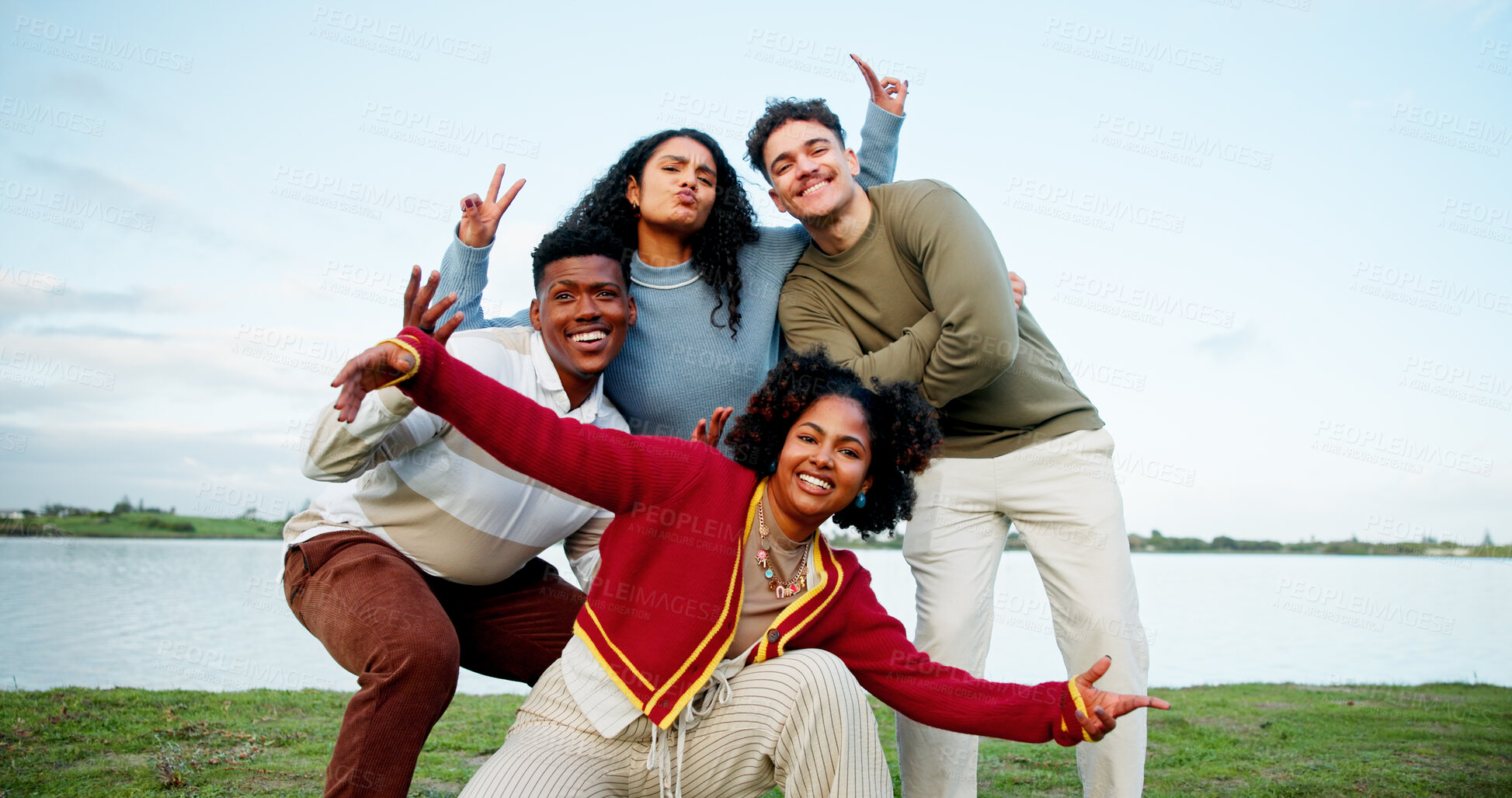 Buy stock photo Happy, portrait of group of friends outdoor for holiday, weekend trip or getaway together. People, connection and students with smile in nature for travel, vacation or adventure by lake for bonding.