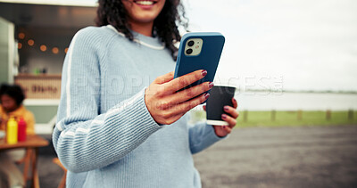 Buy stock photo Happy woman, hands and phone with coffee for social media, post or review at outdoor barista stand. Female person, user or rate with mobile smartphone, subscription or customer service at local cafe