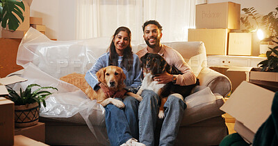 Buy stock photo Couple, dogs and portrait on sofa in new house for mortgage success, security and bonding together. Night, people and happy with animals in first home for relocation, property investment or moving in