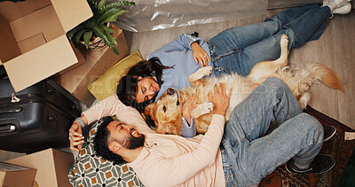 Buy stock photo Couple, dog and relax on floor in new home for mortgage purchase, security and bonding together. Above, people and moving in to pet friendly house for real estate, property investment and achievement